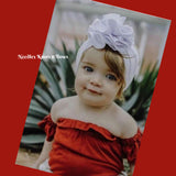 Infants, newborns and toddlers white messy bow headband.