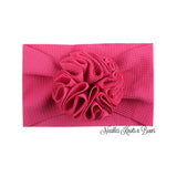 Baby girls fuchsia messy bow headband