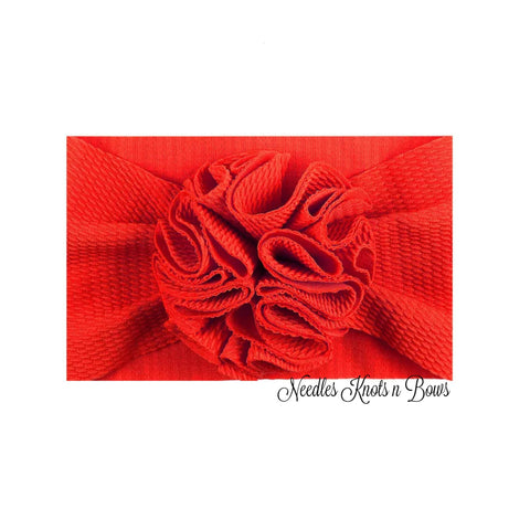 Baby girls red messy bow headband.