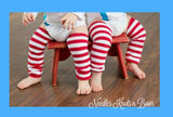 Red and white striped leg warmers