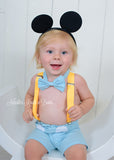 Boys Blue Mickey Mouse cake smash outfit with Mickey Mouse ears.