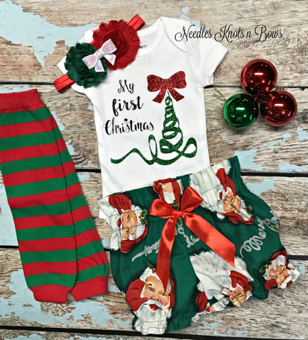 Baby Girls “My first Christmas” outfit   My first Christmas onesie paired with our darling Santa bloomers making this set a must have for your little ones first Christmas milestone. 
