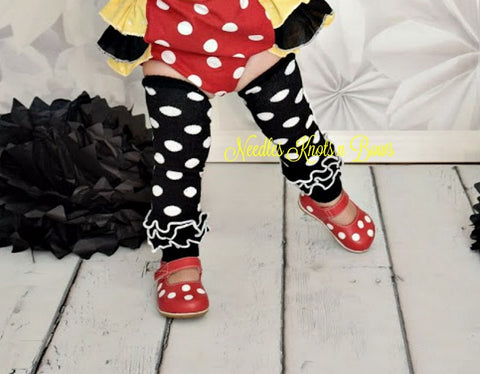 Black polka dot leg warmers with ruffles at the bottom. Baby, toddler leg warmers for girls.