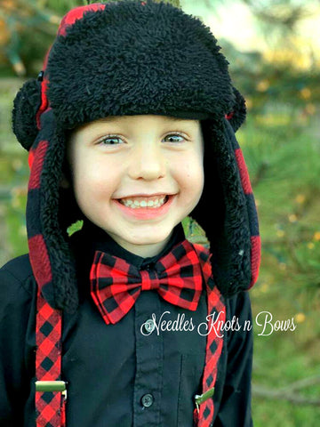 How dashing does this little guy look in our Buffalo plaid bow tie with custom order matching suspenders. (Available upon request)