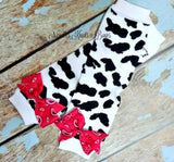 Cow print leg warmers with bows