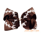 7' football hair bow, perfect for going out to the game, supporting siblings team and of course cheerleaders