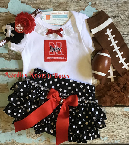 Baby girls and toddlers Nebraska Cornhuskers outfit.  Baby NCAA outfit for girls.