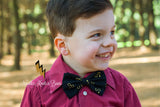 Harry Potter bow tie. Harry Potters Glasses and lightning bolts in gold on a black background bow tie.