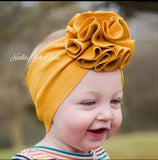 Baby girls and toddlers mustard messy bow headband. Newborns, infants and toddlers mustard headwrap.
