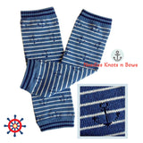 Leg warmers with anchors on blue stripes. Nautical leg warmers