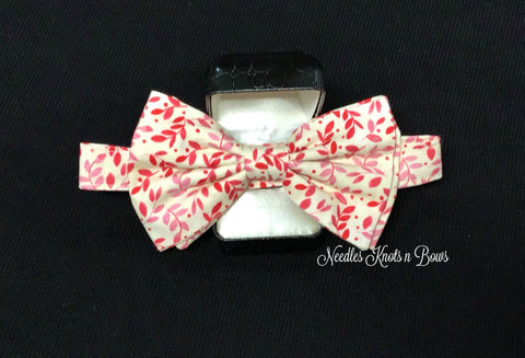 Shades of pink floral bow tie, perfect for weddings and other special occasions. 