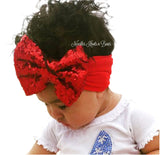 Red sequin bow headwrap for baby girls and toddlers.  Great for pairing up with their matching outfits. 