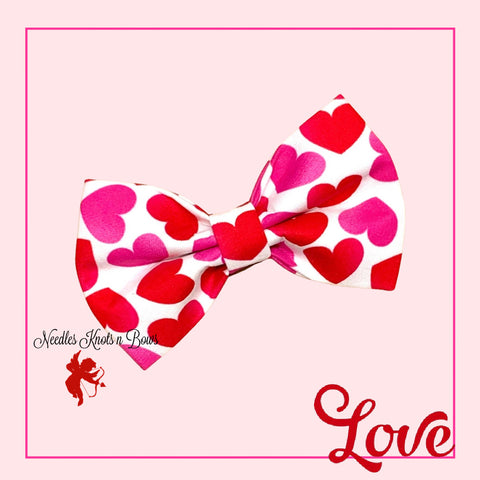 Red and pink hearts on a white Valentines Bow Tie